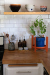 PALLA orange plant stand