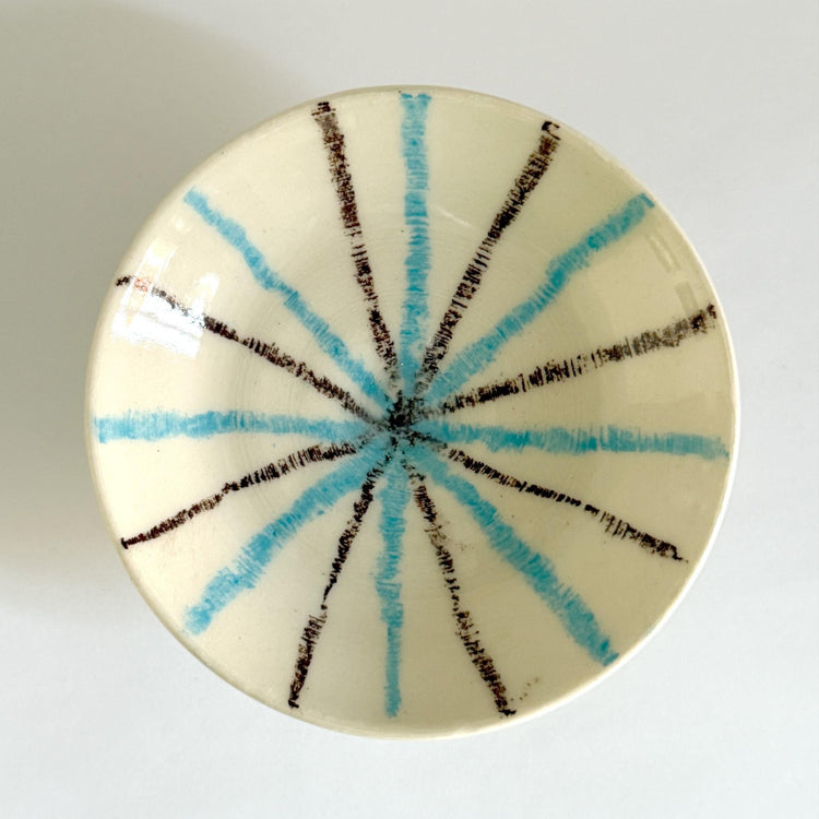 Small blue and brown fireworks plate