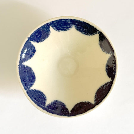 Small plate with blue petals