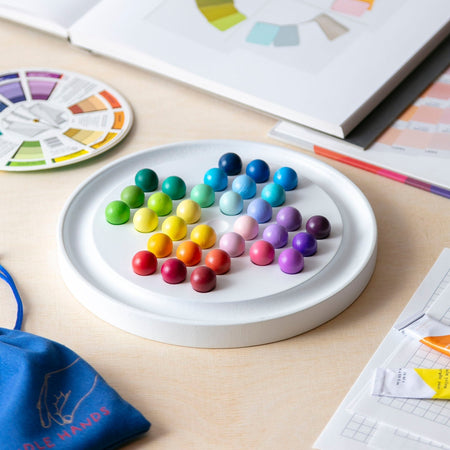 Multicolored wooden solitaire game