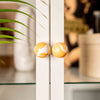 White and orange marbled handle (or hook)