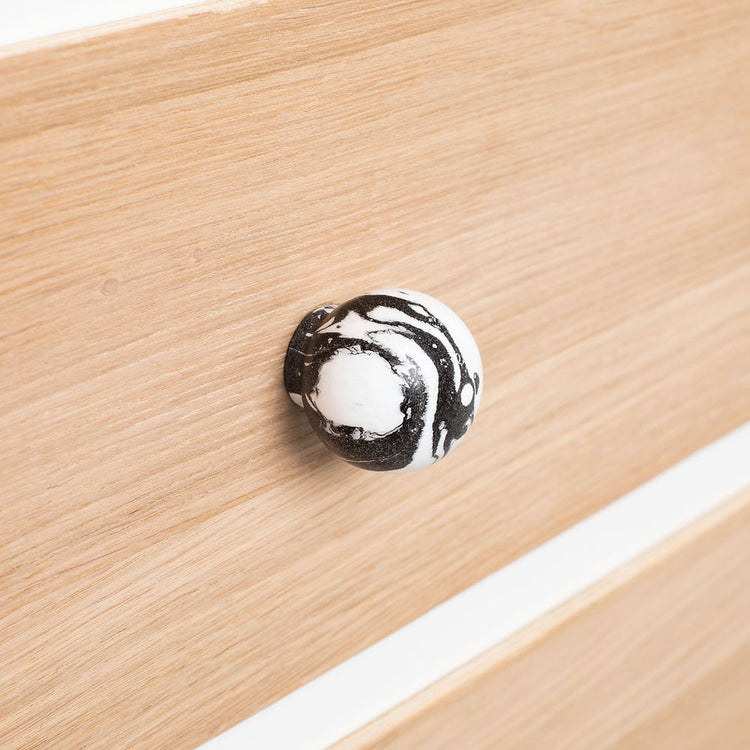 White and black marbled handle (or hook)