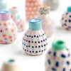 Mini ceramic vase with purple patterns