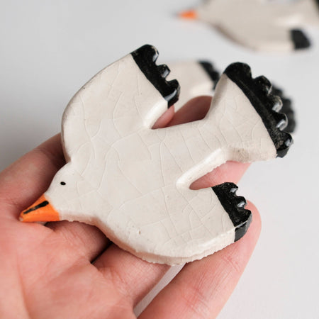 Aimant en céramique Oiseau blanc