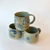 Tasse abstraite verte et bleue