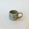 Tasse abstraite verte et bleue