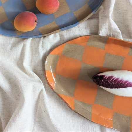 Assiette ovale à carreaux oranges