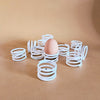 Spirale egg cup and napkin ring duo