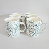 Set of 2 second hand speckled cups 