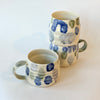 Tasse abstraite bleue et verte