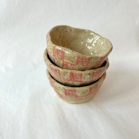 Checkered ceramic cup