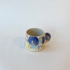 Tasse abstraite bleue et pêche
