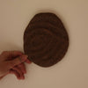 Earthen wall sculpture