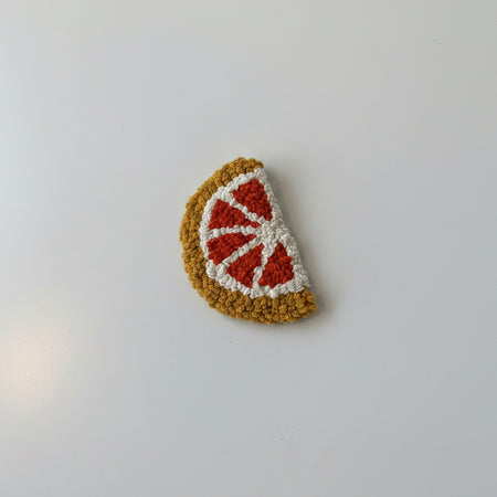 Pièce textile murale 'Orange Slice'