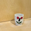 Tasse gobelet en porcelaine Bonhomme sourire