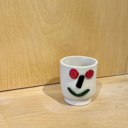 Porcelain tumbler cup Smiling man