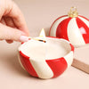 Bougie boule de Noël cannelle [tel quel]