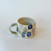 Tasse abstraite bleue et verte