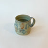 Tasse abstraite verte et bleue