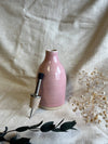 Huilier rose en céramique