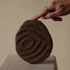 Earthen wall sculpture