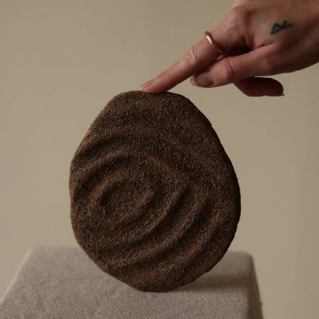 Earthen wall sculpture