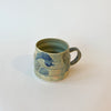 Tasse abstraite verte et bleue