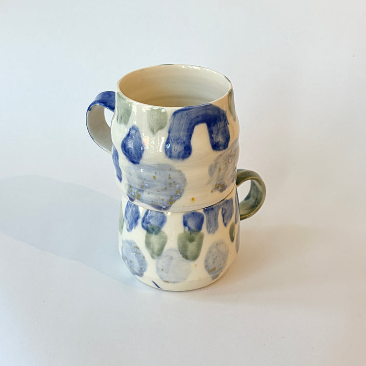 Tasse abstraite bleue et verte
