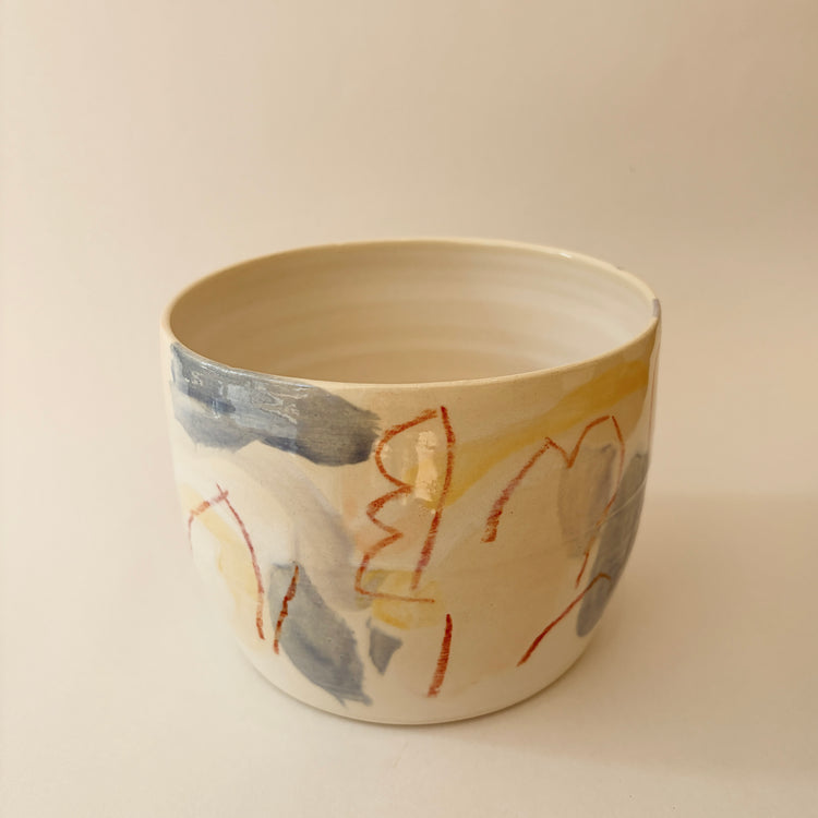 Cache-pot en céramique jaune et bleu