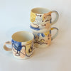 Tasse abstraite bleue et pêche