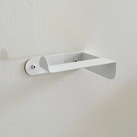 Compact white toilet paper holder 