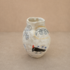 Petit vase pincé en céramique