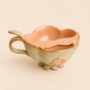 Tasse à thé verte avec protège moustache