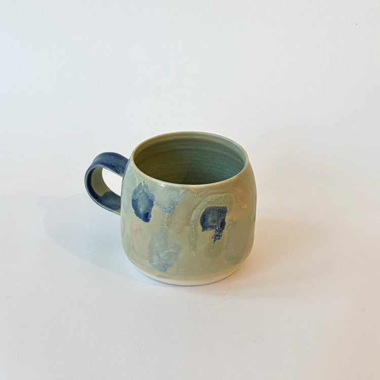 Tasse abstraite verte et bleue