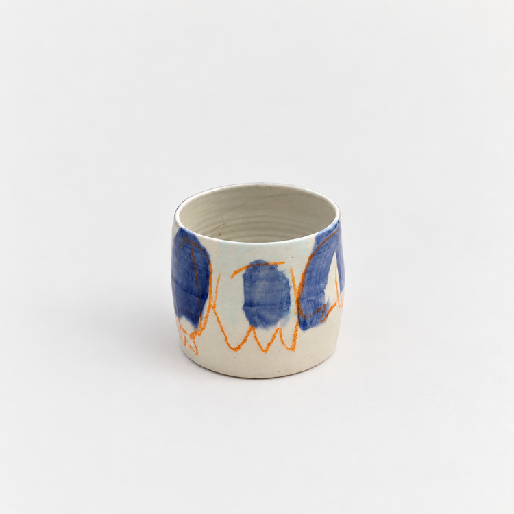 Gobelet abstrait orange et bleu