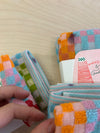 Ensemble de 2 débarbouillettes Damier [tel quel]