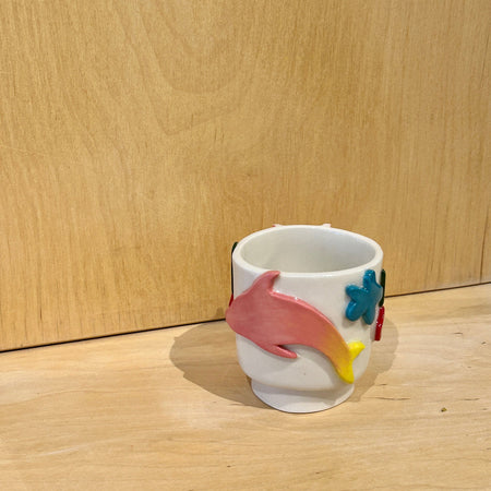 Dolphin porcelain tumbler mug