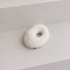 Petit coussin rond bleu et blanc