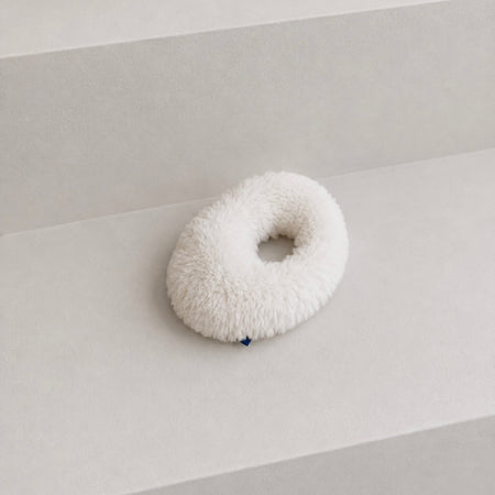 Petit coussin rond bleu et blanc
