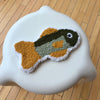 Pièce textile murale 'Baby trout'