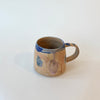 Tasse abstraite sable et bleue