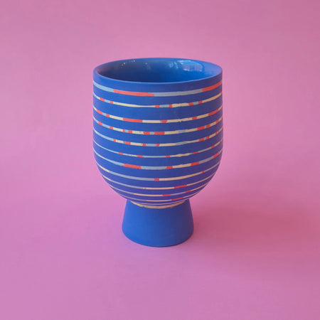 Blue lined goblet on foot