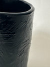 Tasse noire texturée en céramique