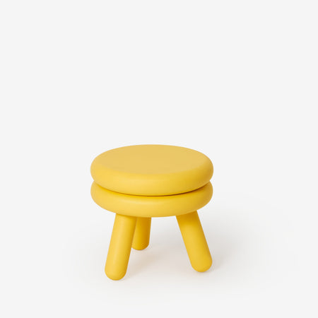 Small yellow Pluma wooden stool 