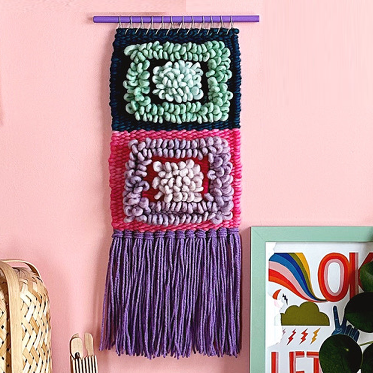 Original wall weaving with purple fringe