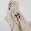 Cream socks with red loop