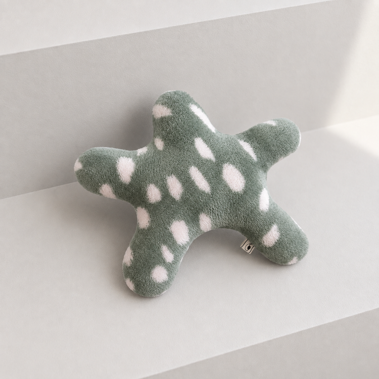 Petit coussin fleur grise