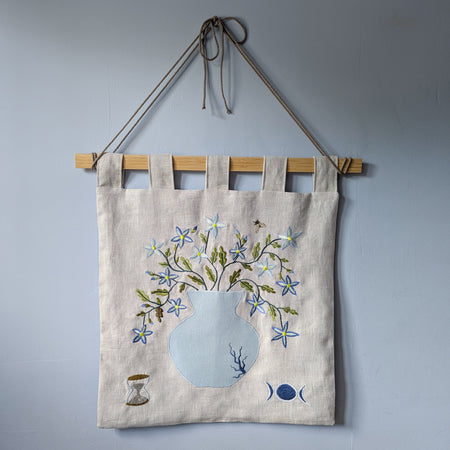 Floral textile wall hanging
