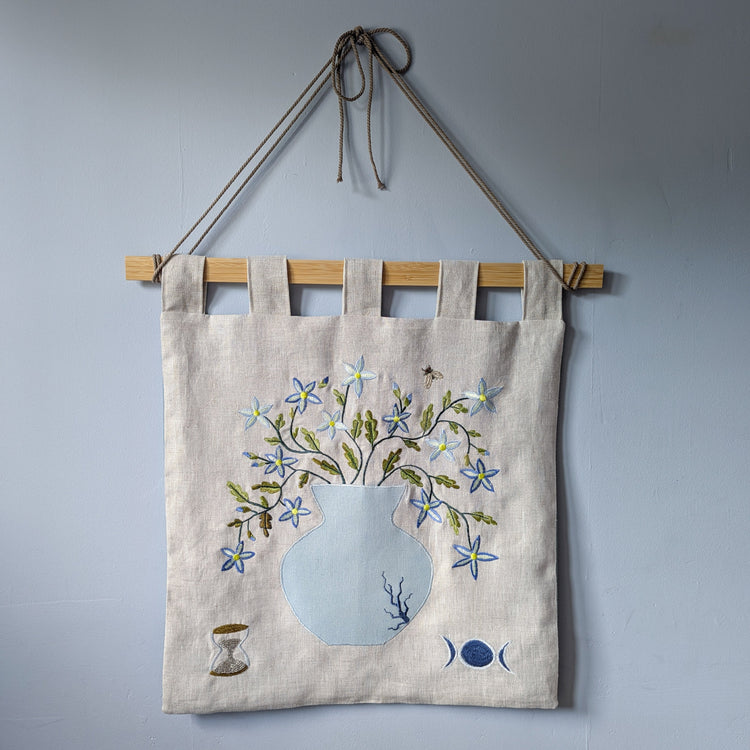 Floral textile wall hanging