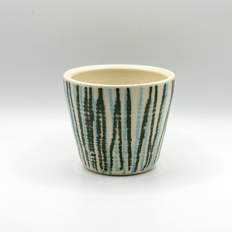 Green and blue striped ceramic tumbler